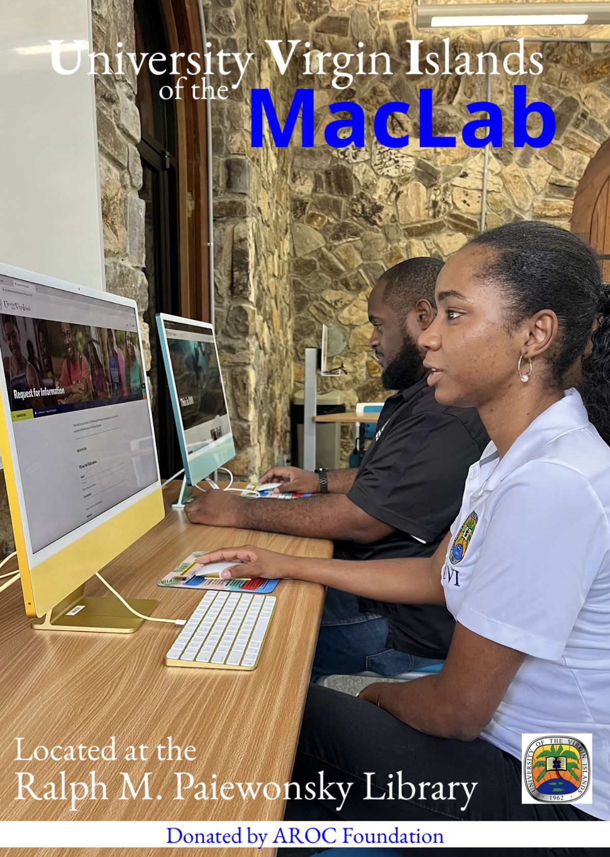 University of the Virgin Islands students working at computers in the AROC-supported Mac Lab